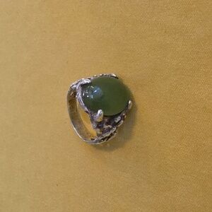 Vintage brutalist silver ring with an oval-cut Green jade cabochon (unmarked)